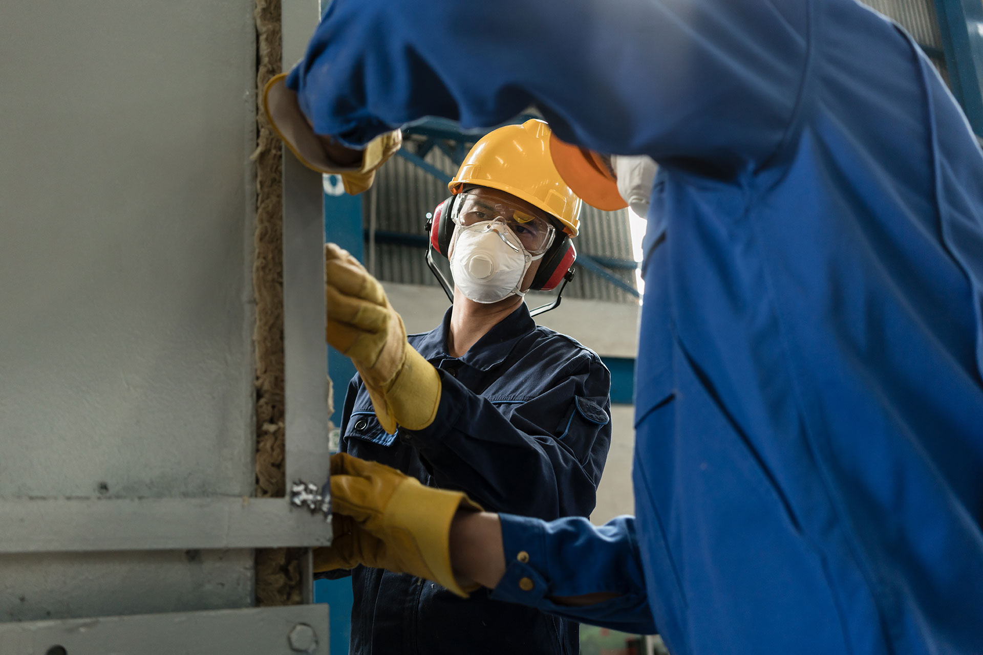 Factory workers working on a construction project